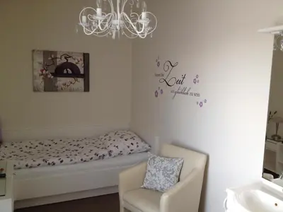 Ein Bett oder Betten in einem Zimmer der Unterkunft Gästehaus Graul