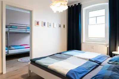 Ein Bett oder Betten in einem Zimmer der Unterkunft Harzquartier
