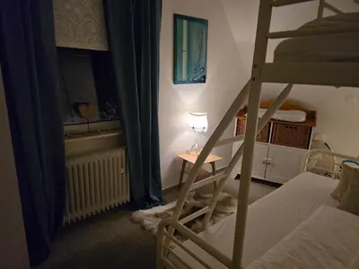 Ein Bett oder Betten in einem Zimmer der Unterkunft Pension Haus am Wald