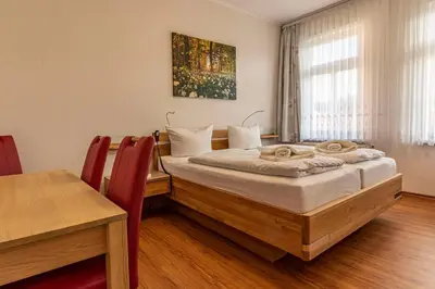 Ein Bett oder Betten in einem Zimmer der Unterkunft Ferienwohnung Margot