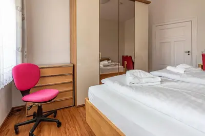 Ein Bett oder Betten in einem Zimmer der Unterkunft Ferienwohnung Margot