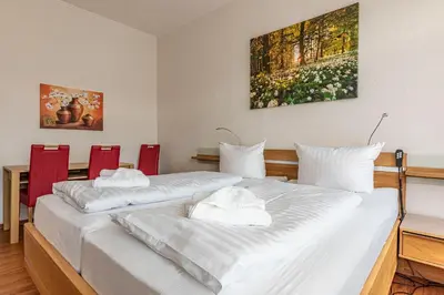 Ein Bett oder Betten in einem Zimmer der Unterkunft Ferienwohnung Margot
