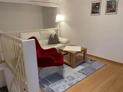 Ein Sitzbereich in der Unterkunft Apartment No6