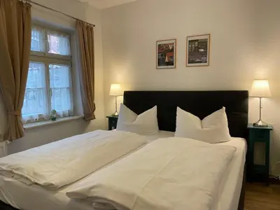 Ein Bett oder Betten in einem Zimmer der Unterkunft Apartment No6