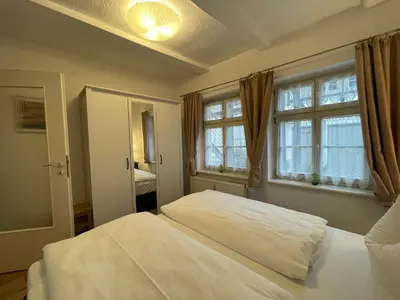 Ein Bett oder Betten in einem Zimmer der Unterkunft Apartment No6