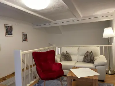 Ein Sitzbereich in der Unterkunft Apartment No6