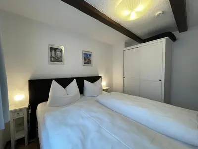 Ein Bett oder Betten in einem Zimmer der Unterkunft Apartment mit Dachterrasse No11