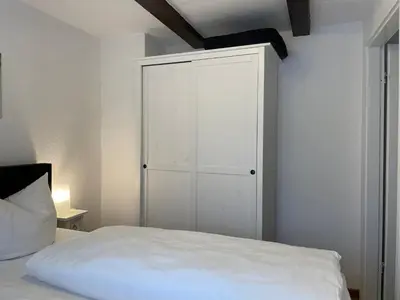 Ein Bett oder Betten in einem Zimmer der Unterkunft Apartment mit Dachterrasse No11