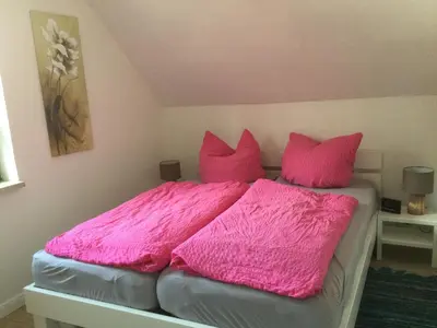 Ein Bett oder Betten in einem Zimmer der Unterkunft Dani´s Feriendomizil