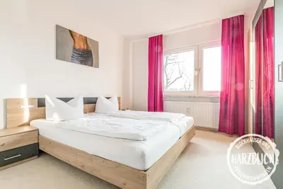 Ein Bett oder Betten in einem Zimmer der Unterkunft Ferienwohnung Harzblick 2
