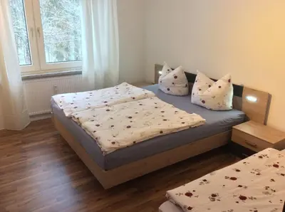 Ein Bett oder Betten in einem Zimmer der Unterkunft Ferienwohnung Harzblick 2