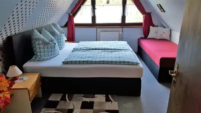 Ein Bett oder Betten in einem Zimmer der Unterkunft Birkenhain