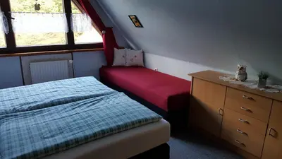 Ein Bett oder Betten in einem Zimmer der Unterkunft Birkenhain