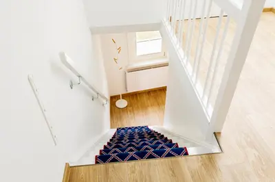 Ein Bett oder Betten in einem Zimmer der Unterkunft Ferienwohnung Bad Sachsa Harz