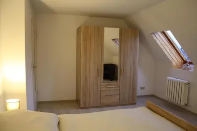 Ein Bett oder Betten in einem Zimmer der Unterkunft Ferienwohnung im Harz