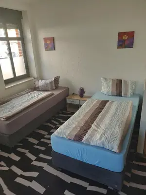 Ein Bett oder Betten in einem Zimmer der Unterkunft Hostel Vorharz Quedlinburg