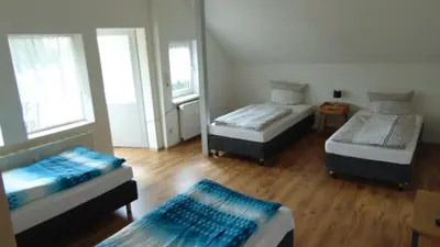 Ein Bett oder Betten in einem Zimmer der Unterkunft Hostel Vorharz Quedlinburg