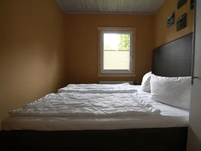 Ein Bett oder Betten in einem Zimmer der Unterkunft Ferienhaus in Clausthal-Zellerfeld mit Terrasse