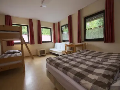 Ein Bett oder Betten in einem Zimmer der Unterkunft Apartments in Wieda