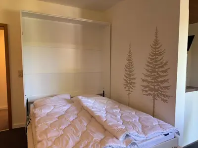 Ein Bett oder Betten in einem Zimmer der Unterkunft Wohnung in Altenau nahe Harzgebirge