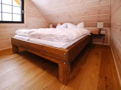 Ein Bett oder Betten in einem Zimmer der Unterkunft Cottage, Schierke