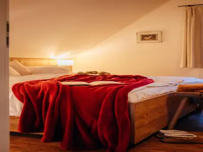 Ein Bett oder Betten in einem Zimmer der Unterkunft Ferienhaus in Schierke mit Garten