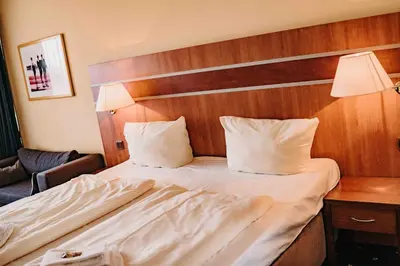 Ein Bett oder Betten in einem Zimmer der Unterkunft Haus am See HS 833