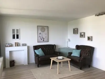 Ein Sitzbereich in der Unterkunft Panoramic Apartments Hohegeiß