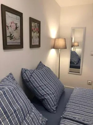 Ein Bett oder Betten in einem Zimmer der Unterkunft Ferienchalet Flößwehrtal