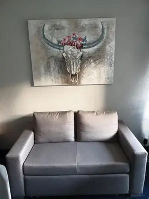 Ein Sitzbereich in der Unterkunft Apartment am Kranichsee Vier Jahreszeiten