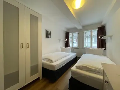 Ein Bett oder Betten in einem Zimmer der Unterkunft Urlaub im Fachwerk - Das Sattlerhaus