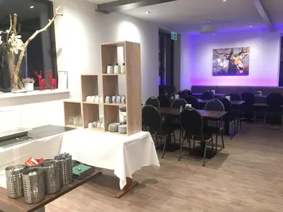 Ein Sitzbereich in der Unterkunft Harz House