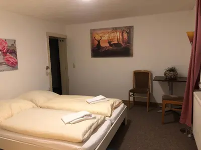 Ein Bett oder Betten in einem Zimmer der Unterkunft Harz House