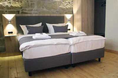 Ein Bett oder Betten in einem Zimmer der Unterkunft Ferienwohnung Tilia
