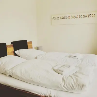 Ein Bett oder Betten in einem Zimmer der Unterkunft Kleine Harzzeit