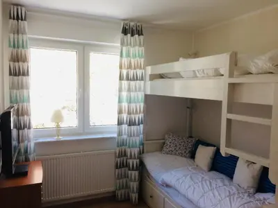 Ein Bett oder Betten in einem Zimmer der Unterkunft Kleine Harzzeit