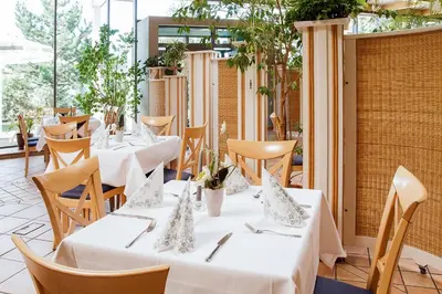 Ein Restaurant oder anderes Speiselokal in der Unterkunft Hotel Am Sommerbad