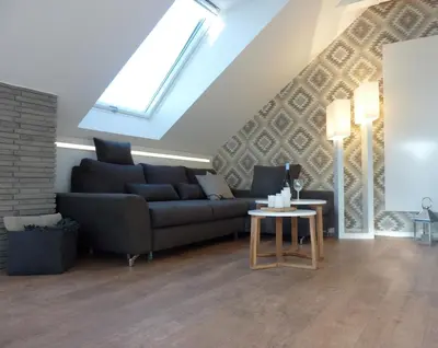 Ein Sitzbereich in der Unterkunft Ferienwohnung am Wald