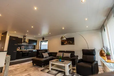 Ein Sitzbereich in der Unterkunft Ferienwohnung Brunnenbach II
