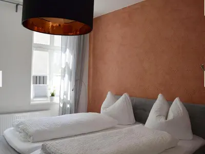 Ein Bett oder Betten in einem Zimmer der Unterkunft Zum Jakobi 1
