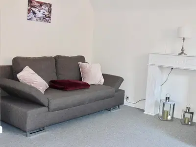 Ein Sitzbereich in der Unterkunft Ferienwohnung Sagenhaft