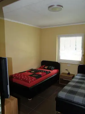 Ein Bett oder Betten in einem Zimmer der Unterkunft Ferienhaus 