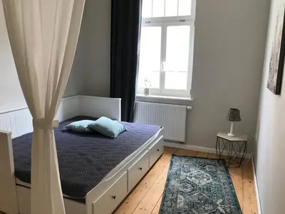 Ein Bett oder Betten in einem Zimmer der Unterkunft Villa Hanne mit Garten
