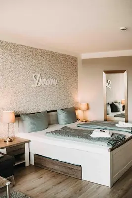 Ein Bett oder Betten in einem Zimmer der Unterkunft Haus am See HS 597