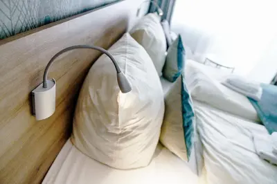Ein Bett oder Betten in einem Zimmer der Unterkunft Haus am See Luxury HS 947