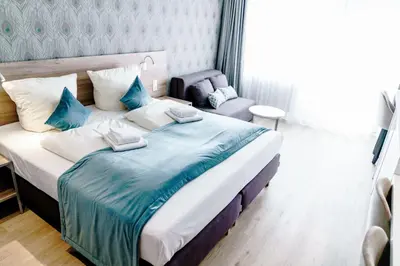 Ein Bett oder Betten in einem Zimmer der Unterkunft Haus am See Luxury HS 947