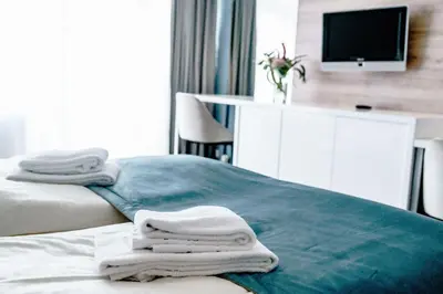 Ein Bett oder Betten in einem Zimmer der Unterkunft Haus am See Luxury HS 947
