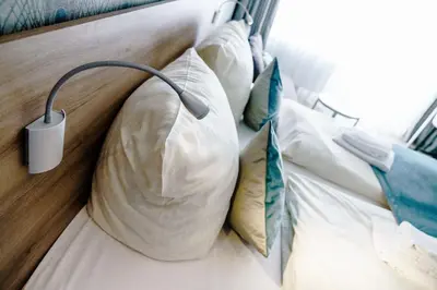 Ein Bett oder Betten in einem Zimmer der Unterkunft Haus am See Luxury HS 947