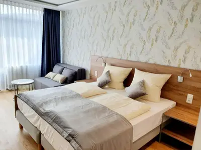 Ein Bett oder Betten in einem Zimmer der Unterkunft Haus am See Luxury HS 948