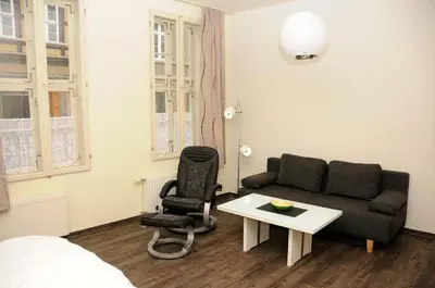 Ein Sitzbereich in der Unterkunft Apartments am Brunnen